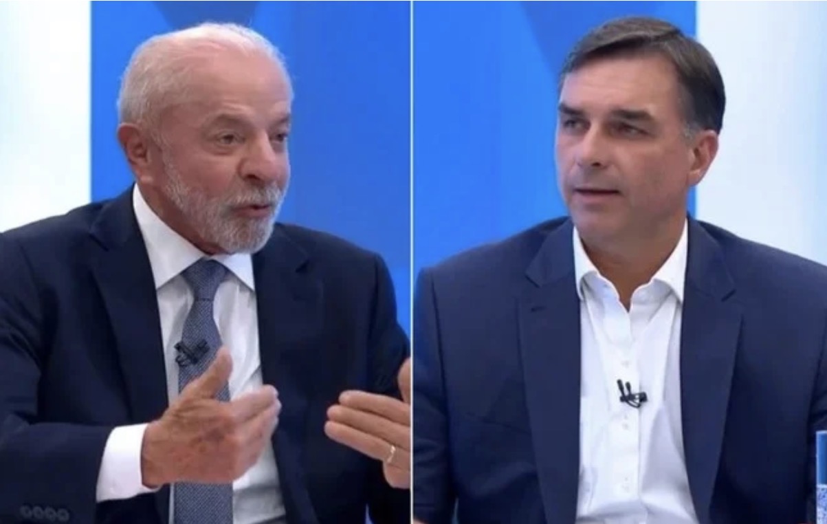 Lula e Flávio Bolsonaro se enfrentam pela primeira vez em debate da Band